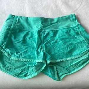 Turquoise lululemon speed up lined shorts